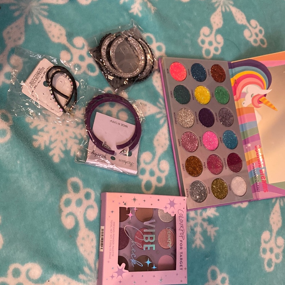3 pair of earrings glittery eyeshadow